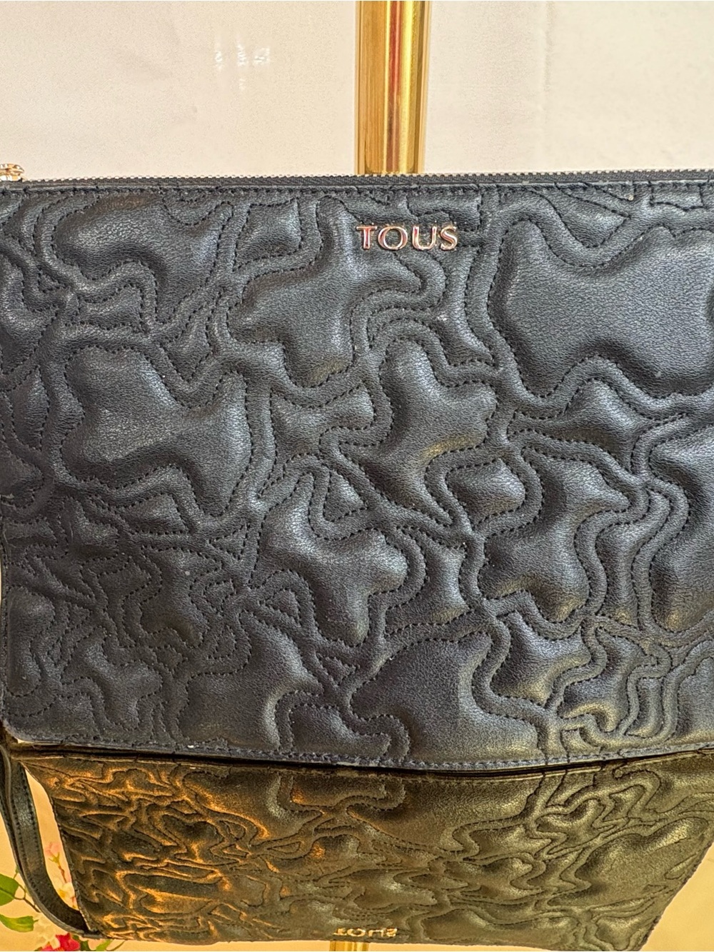 TOUS Black Quilted Leather Wristlet with Scalloped Stitching